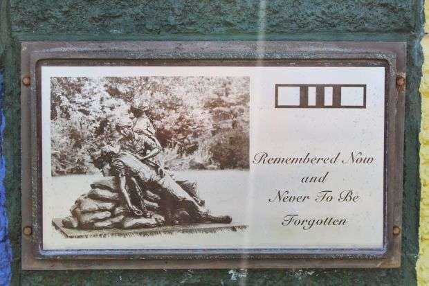 REMEMBER NOW AND NEVER TO BE FORGOTTEN MEMORIAL PLAQUE