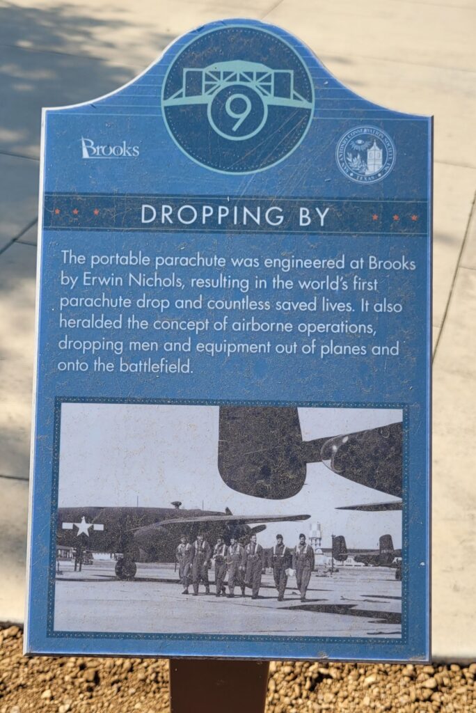 DROOPING BY MEMORIAL PLAQUE