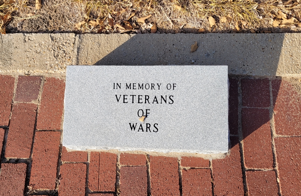 BOSQUEVILLE CEMETERY WAR VETERANS MEMORIAL FLAGPOLE STONE