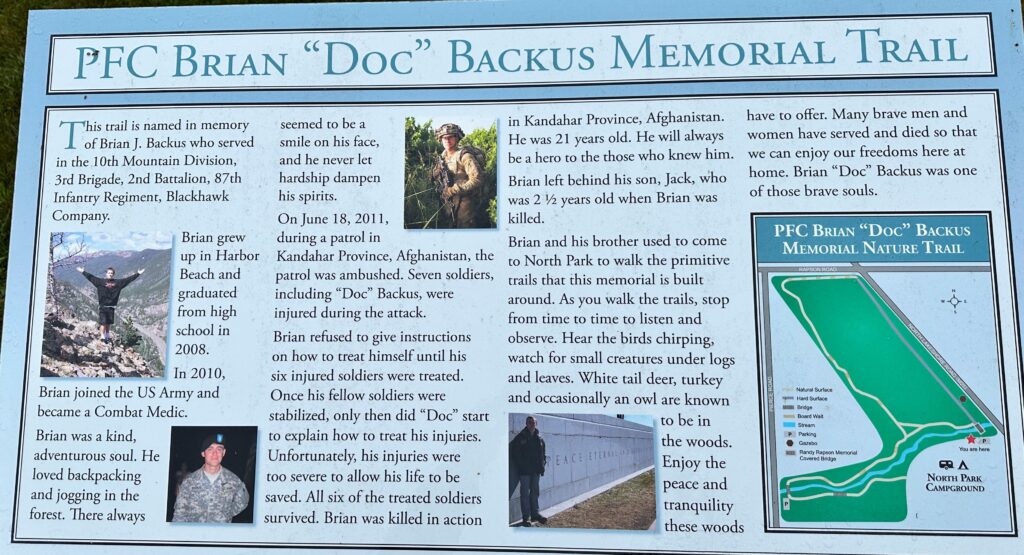 PFC BRIAN “DOC” BACKUS MEMORIAL TRAIL PANEL