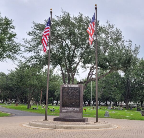 WE REMEMBER ULTIMATE SACRIFICE WAR MEMORIAL