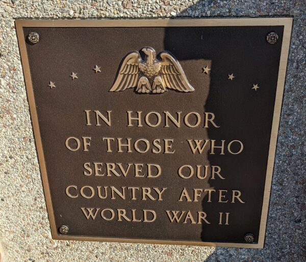 IN TRIBUTE TO THE MEN AND WOMEN WHO ANSWERED THE CALL AFTER WORLD WAR II MEMORIAL PLAQUE B