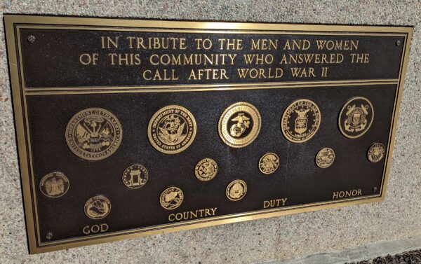IN TRIBUTE TO THE MEN AND WOMEN WHO ANSWERED THE CALL AFTER WORLD WAR II MEMORIAL PLAQUE A