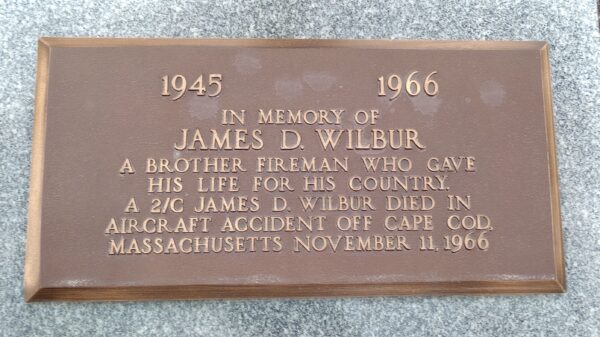 IN MEMORY OF JAMES D. WILBUR MEMORIAL PLAQUE
