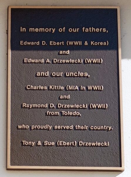 IN MEMORY OF OUR FATHERS WAR MEMORIAL PLAQUE