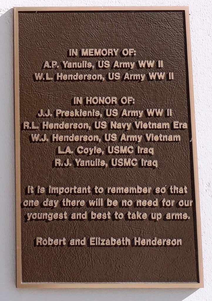 IN MEMORY OF AND IN HONOR OF WAR MEMORIAL PLAQUE