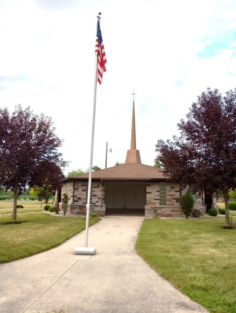 IN HONOR OF OUR DEPARTED VETERANS MEMORIAL FLAGPOLE