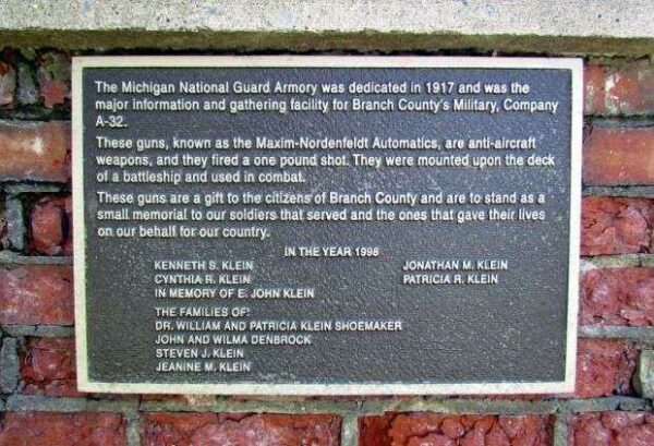 THE MICHIGAN NATIONAL GUARD ARMORY MEMORIAL GUNS PLAQUE