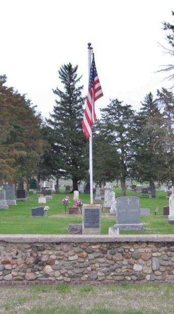 SACRED HEART CEMETERY VETERANS MEMORIAL FLAGPOLE