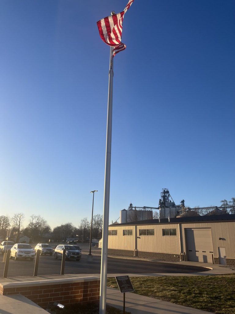 FLAG IN MEMORY OF COLONEL JASON B CHAMNESS MEMORIAL