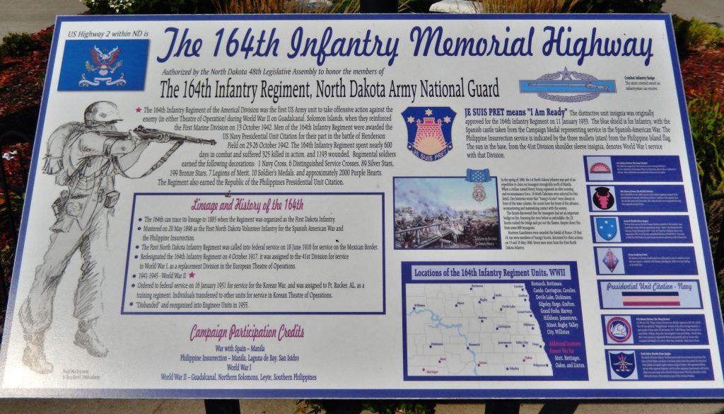 THE 164TH INFANTRY MEMORIAL HIGHWAY PLAQUE
