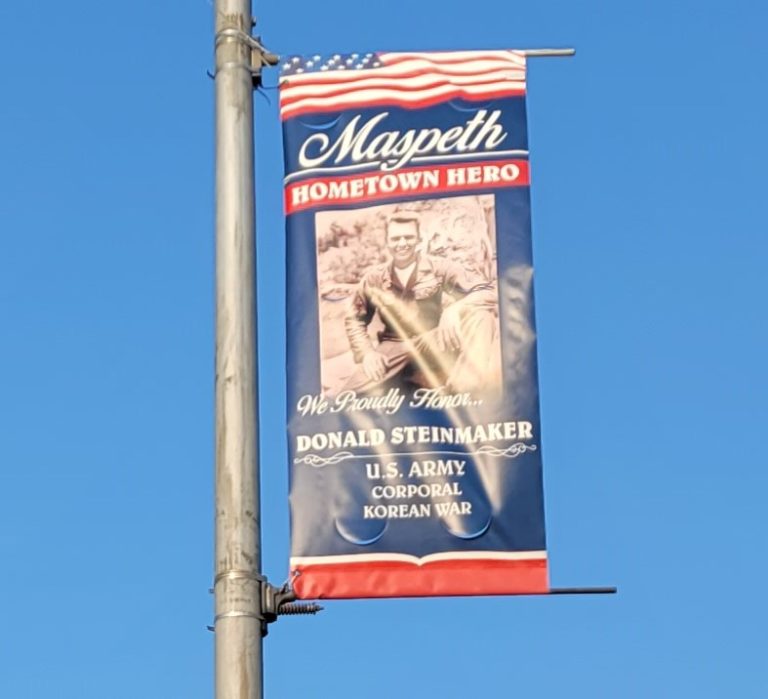 MASPETH HOMETOWN HERO DONALD STEINMAKER MEMORIAL BANNER
