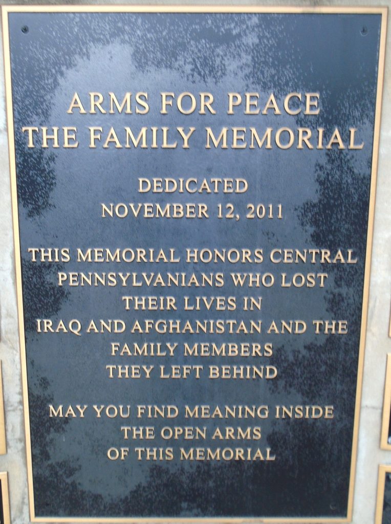 ARMS FOR PEACE THE FAMILY MEMORIAL PLAQUE A