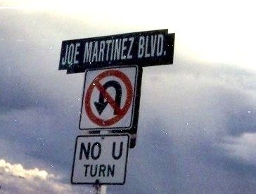 JOE MARTINEZ BLVD WAR MEMORIAL STREET SIGN
