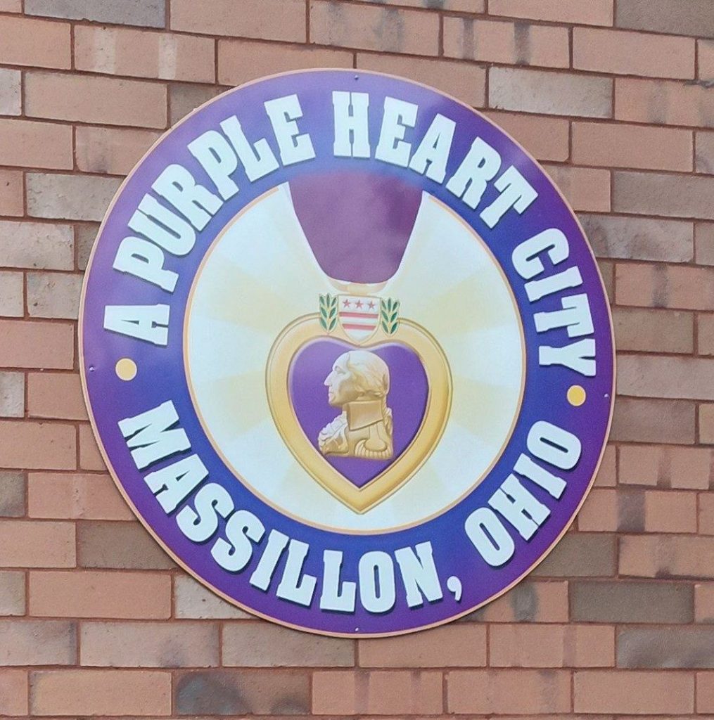 A PURPLE HEART CITY MASSILLON, OHIO WAR MEMORIAL PLAQUE