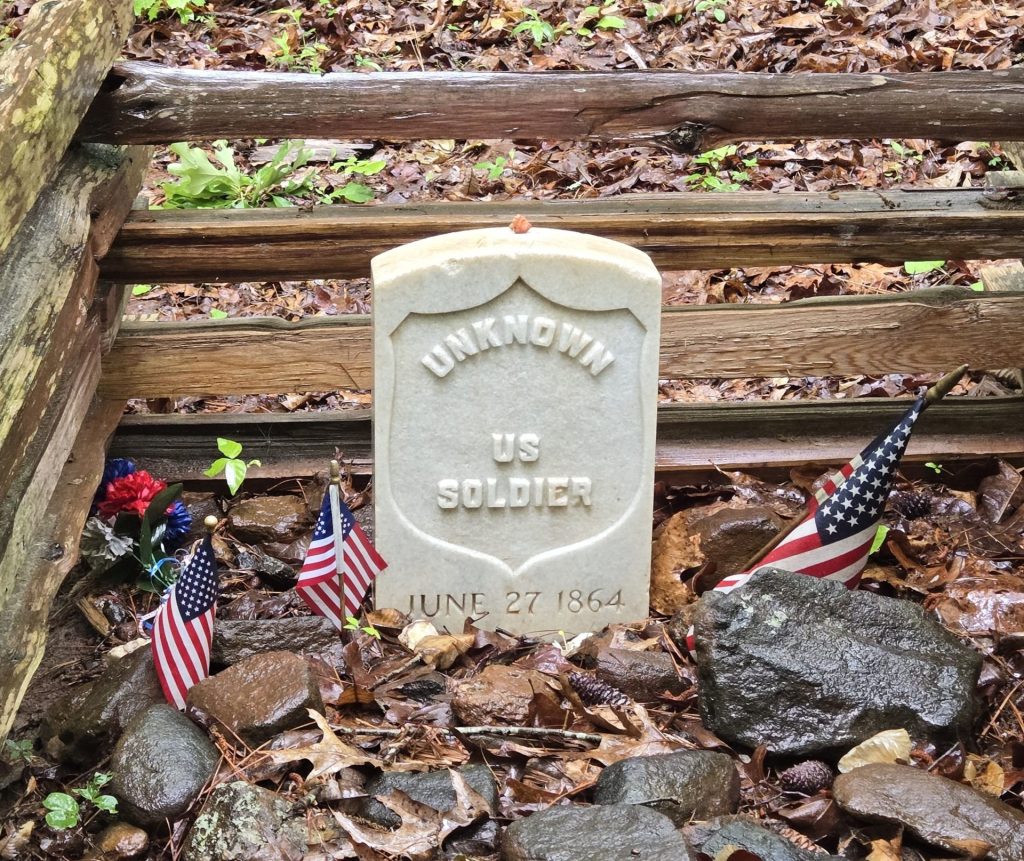 AN UNKNOWN SOLDIER WAR MEMORIAL CEMETERY STONE