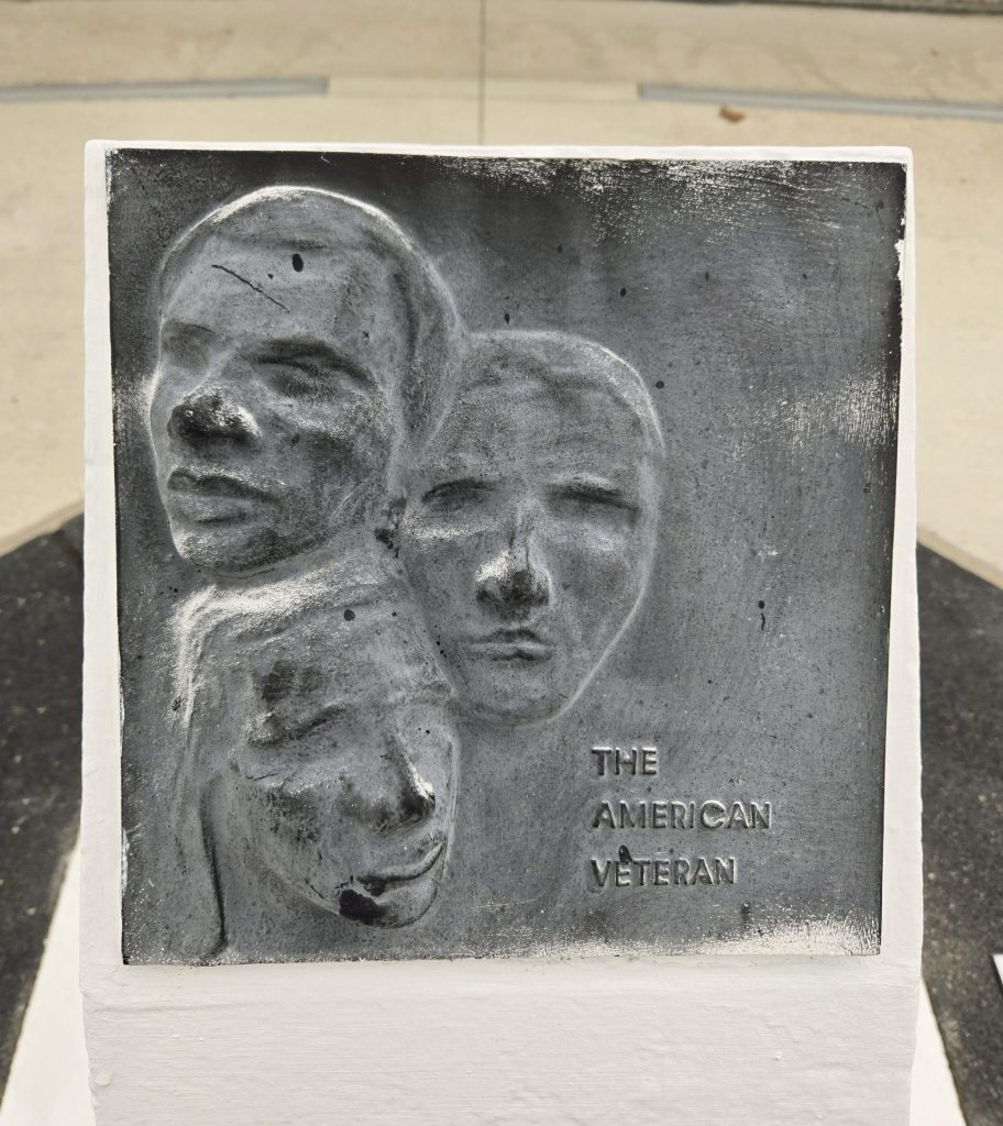 THE AMERICAN VETERANS MEMORIAL PLAQUE