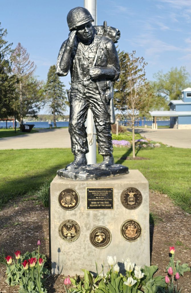 TOWN OF DELAVAN VETERANS MEMORIAL FLAGPOLE STATUE
