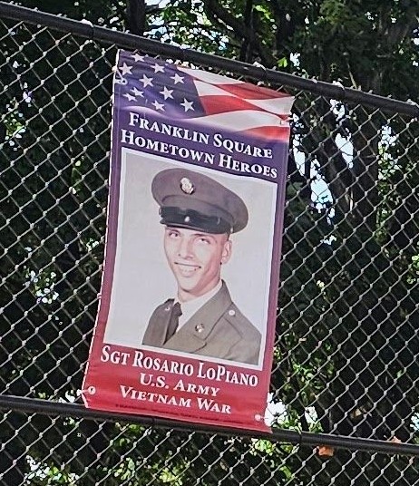 FRANKLIN SQURE HOMETOWN HEROES SGT ROSARIO LOPIANO MEMORIAL BANNER