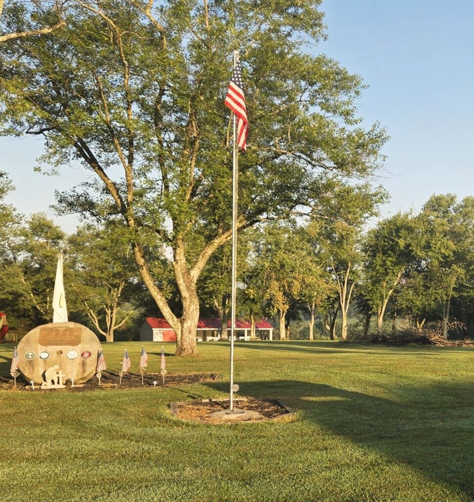 SARDIS COMMUNITY VETERANS WHO SERVED IN THE WARS MEMORIAL FLAGPOLE