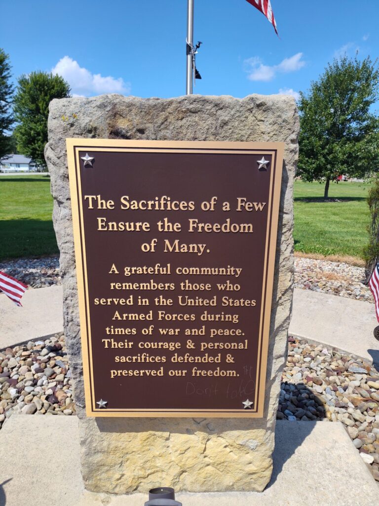 THE SACRIFICES OF A FEW ENSURE THE FREEDOM OF MANY MEMORIAL CLOSE-UP