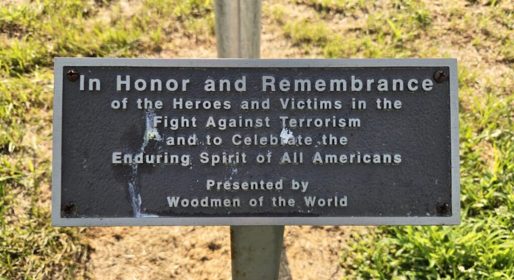 IN HONOR AND REMEMBRANCE OF THE HEROES AND VICTIMS IN THE FIGHT AGAINST TERRORISM MEMORIAL FLAGPOLE PLAQUE