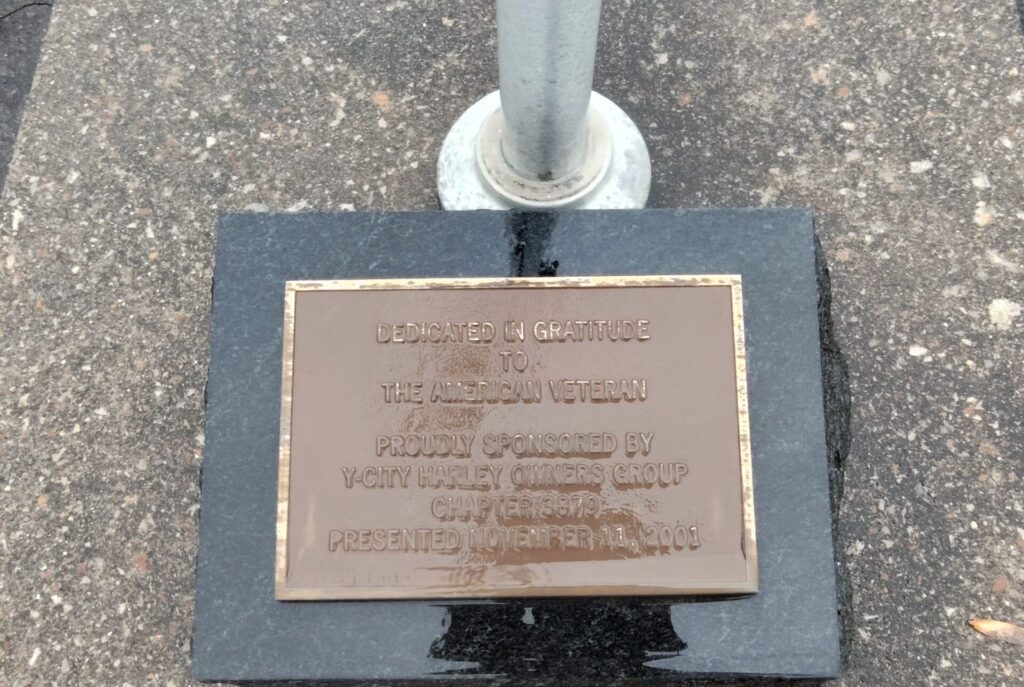 DEDICATED IN GRATITUDE TO THE AMERICAN VETERAN MEMORIAL FLAGPOLE PLAQUE
