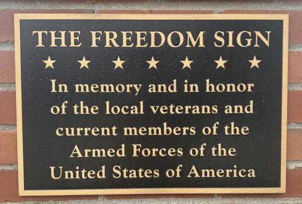 THE FREEDOM SIGN MEMORIAL PLAQUE